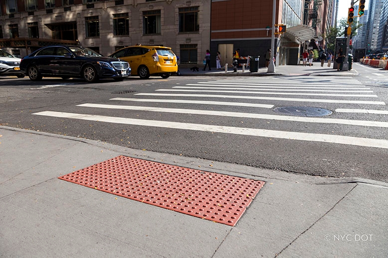 Pedestrian Ramp with a red DWS